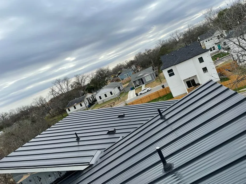 Standing seam metal roof panels with vents for Skylight Repair in Delphos